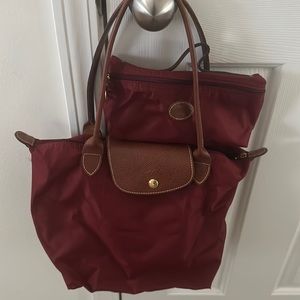 Longchamp Le Pliage medium shoulder bag and small cosmetic bag.